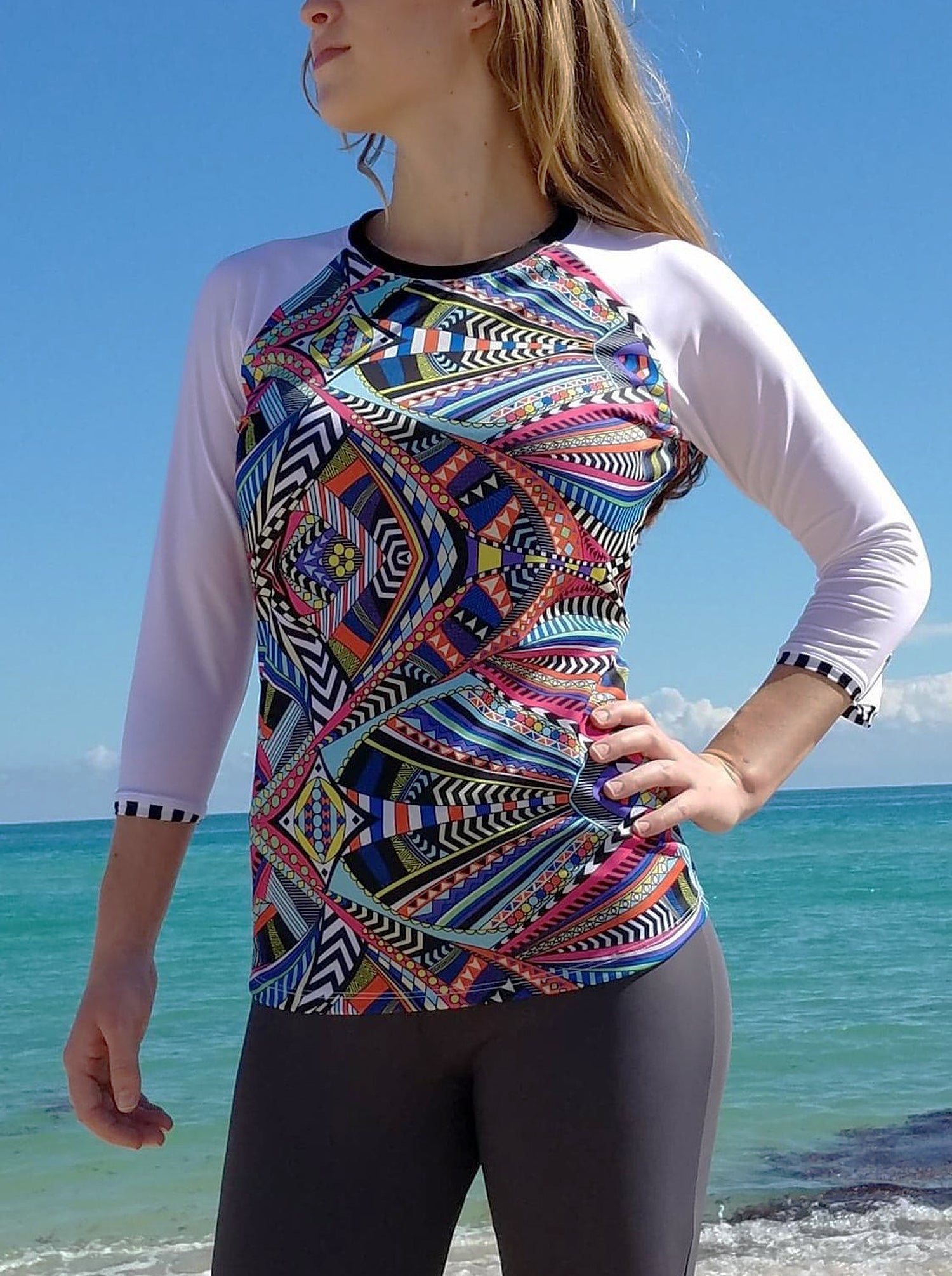 Women's modest long sleeve swim top in colorful print.