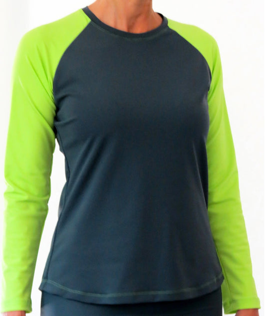 Women's gray swim top with neon green long sleeves.
