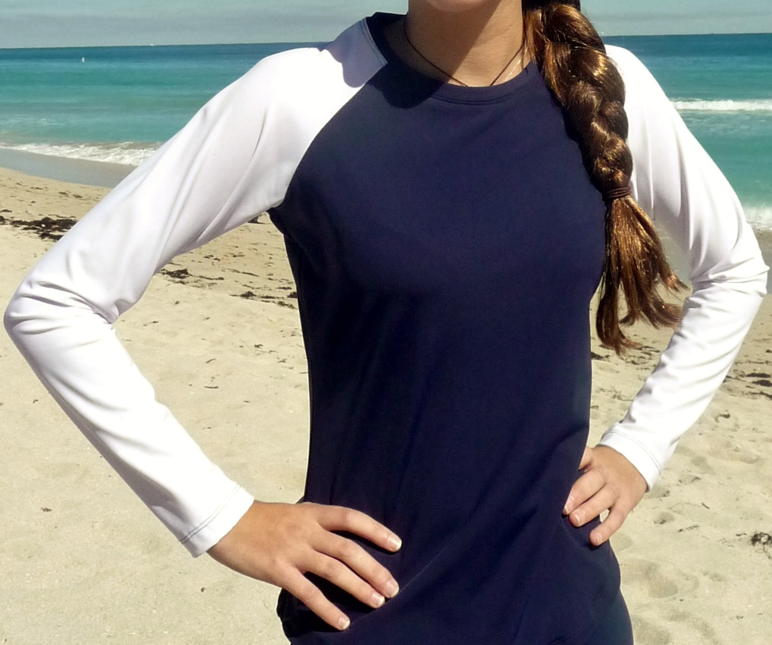 Women's modest swim top in solid navy with white sleeves.