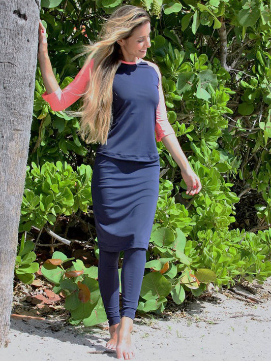 Women's active long skirt with built in leggings in navy blue.