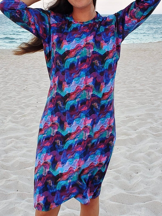 Women's modest long sleeve dress in purple print.