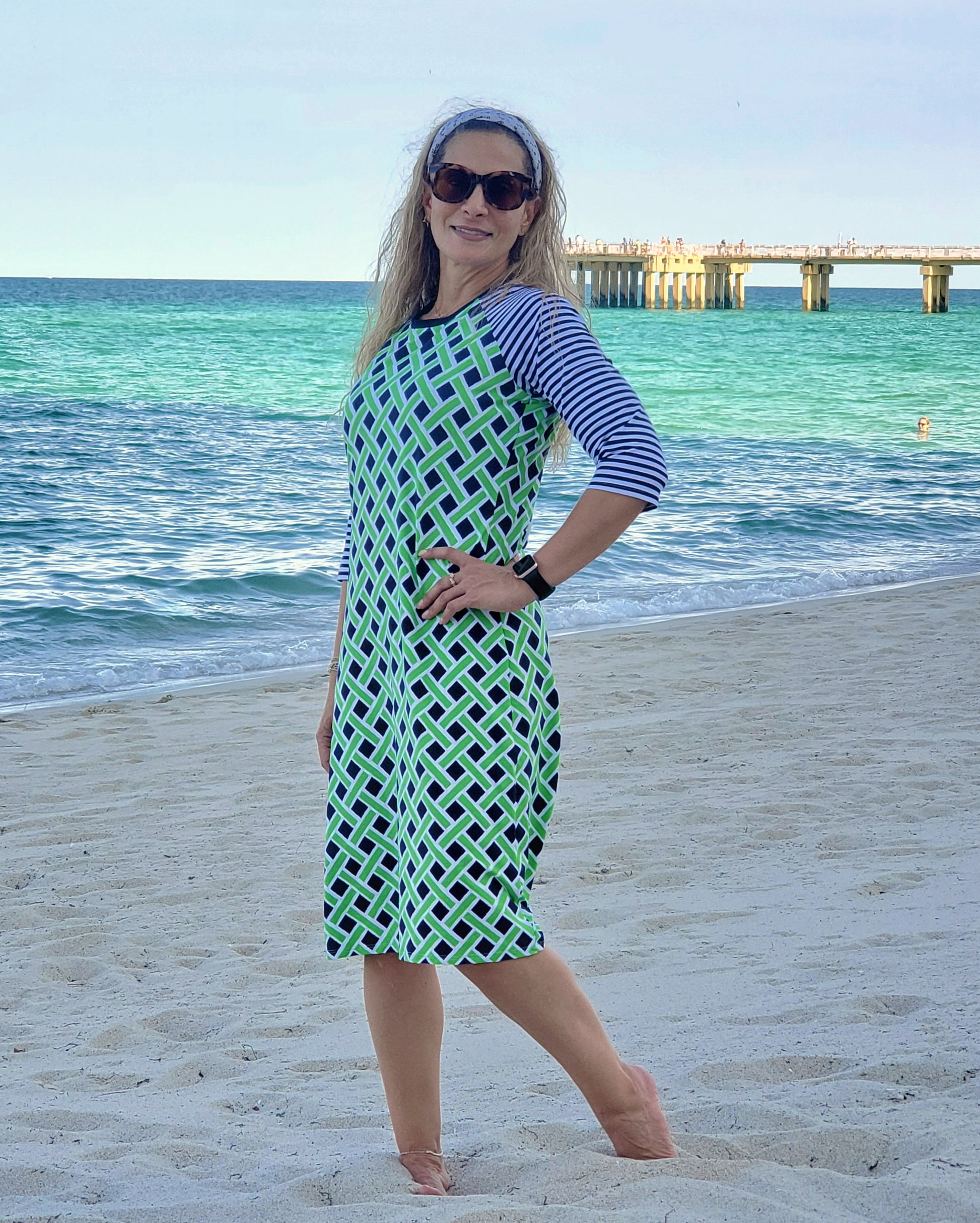 womans modest swimdress in neon green and navy blue print with 3/4 inch sleeves
