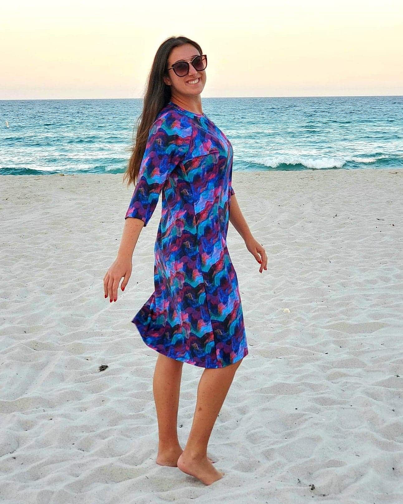 Women's modest long sleeve dress in purple print.