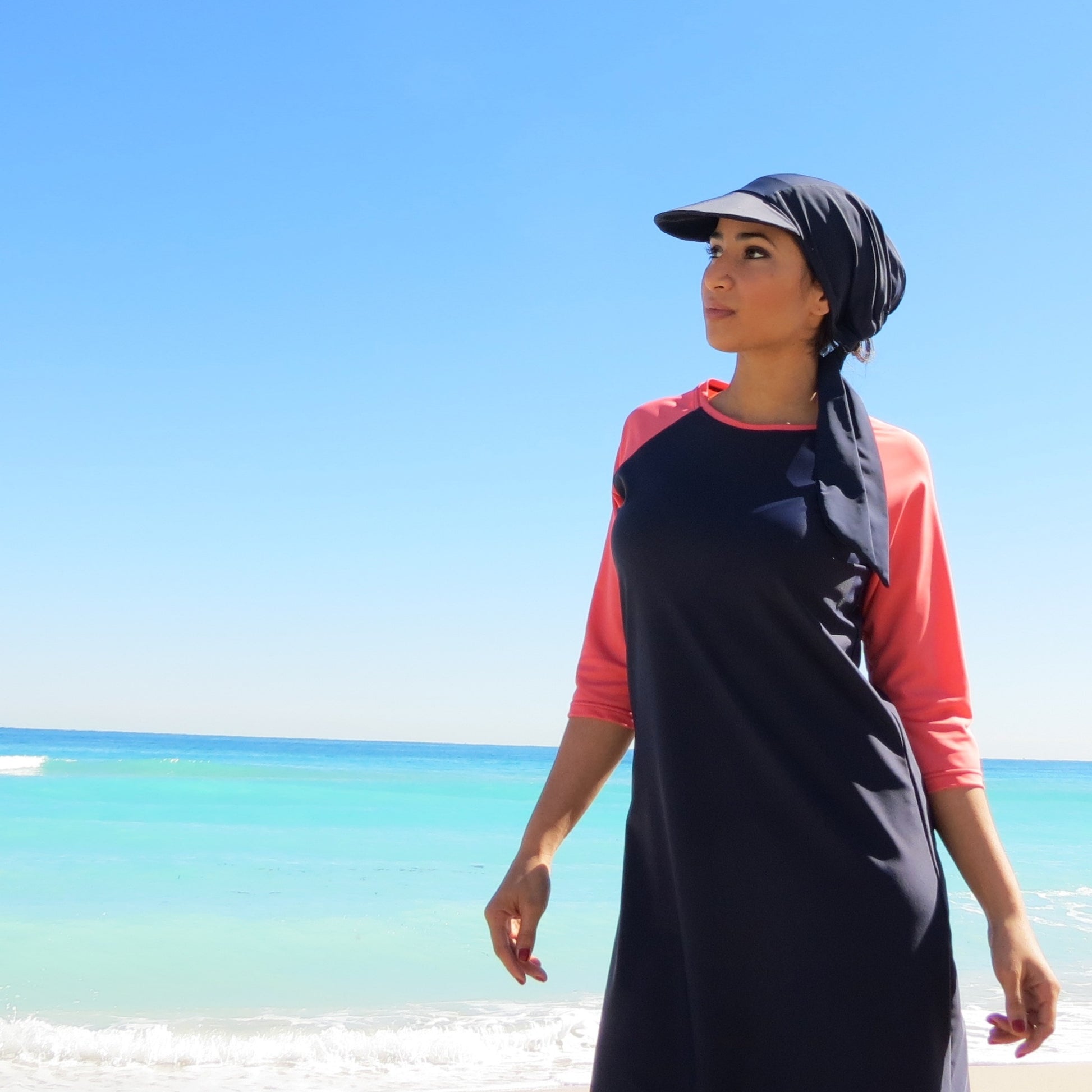 Women's modest swim dress in solid.